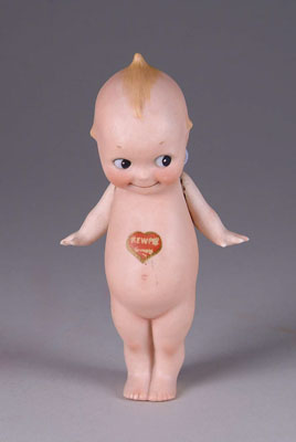 Appraisal: - GERMAN KEWPIE German standing Kewpie with jointed arms and