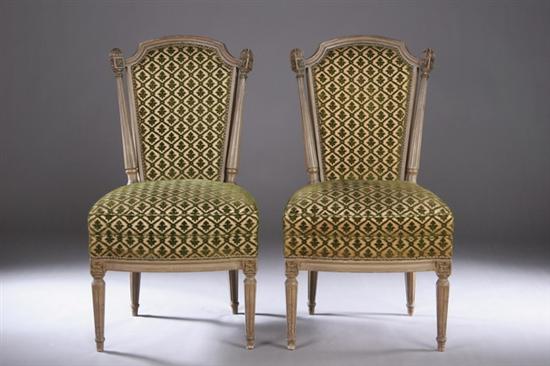 Appraisal: PAIR LOUIS XVI-STYLE PAINTED FAUTEUILS EN CHAPEAU Late th century