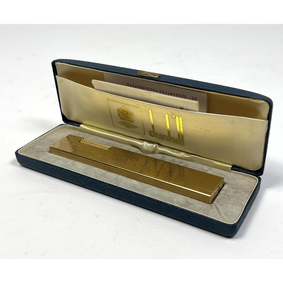 Appraisal: Dunhill gold plated table lighter Marked made in Switzerland With