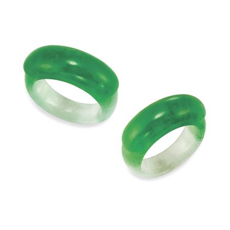 Appraisal: Pair of Bi-Color Jade Saddle Rings Estimate -