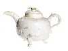 Appraisal: A STAFFORDSHIRE SALTGLAZED WHITE STONEWARE TEAPOT AND A COVER the