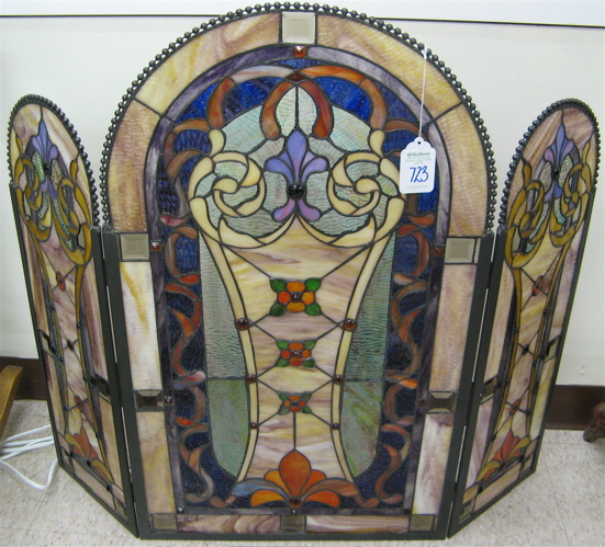 Appraisal: A STAINED AND LEADED GLASS FIREPLACE SCREEN in three panels