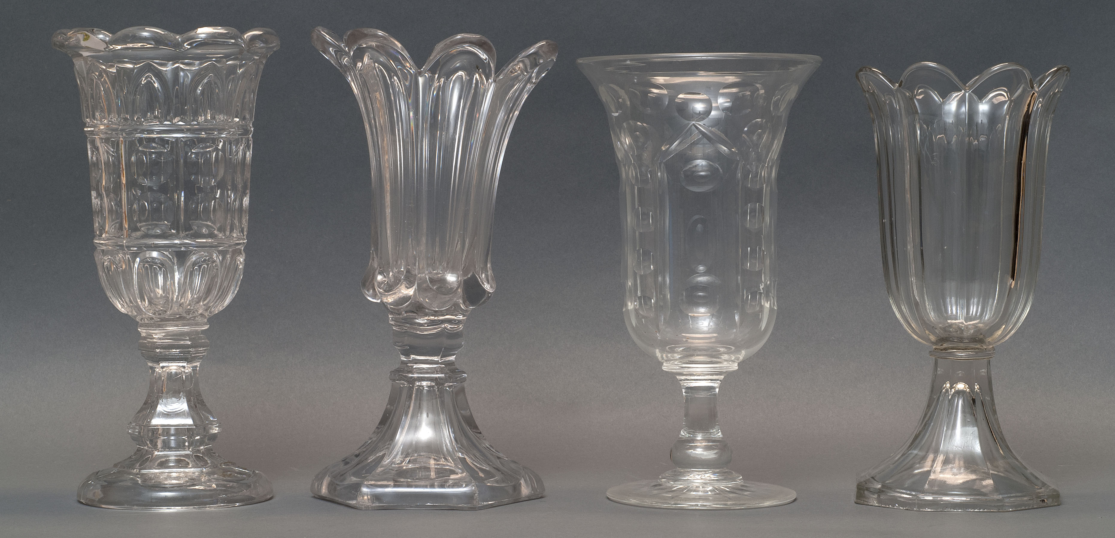 Appraisal: THREE SANDWICH GLASS COMPANY CLEAR FLINT PATTERN GLASS CELERY VASES