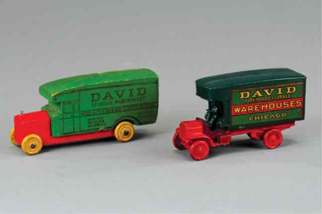 Appraisal: TWO DAVID MOVING VAN TOY TRUCKS Includes cast iron example