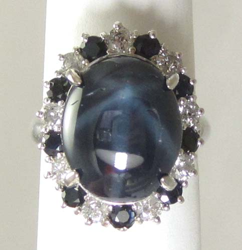 Appraisal: STAR SAPPHIRE AND DIAMOND RING The k white gold ring