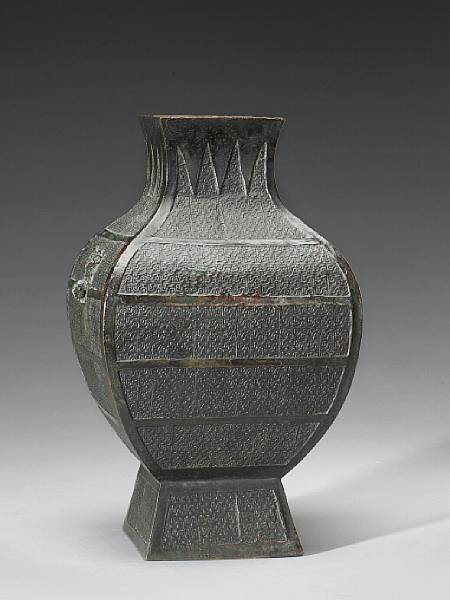 Appraisal: An archaistic square-sectioned bronze vase Late Qing Dynasty Of hu