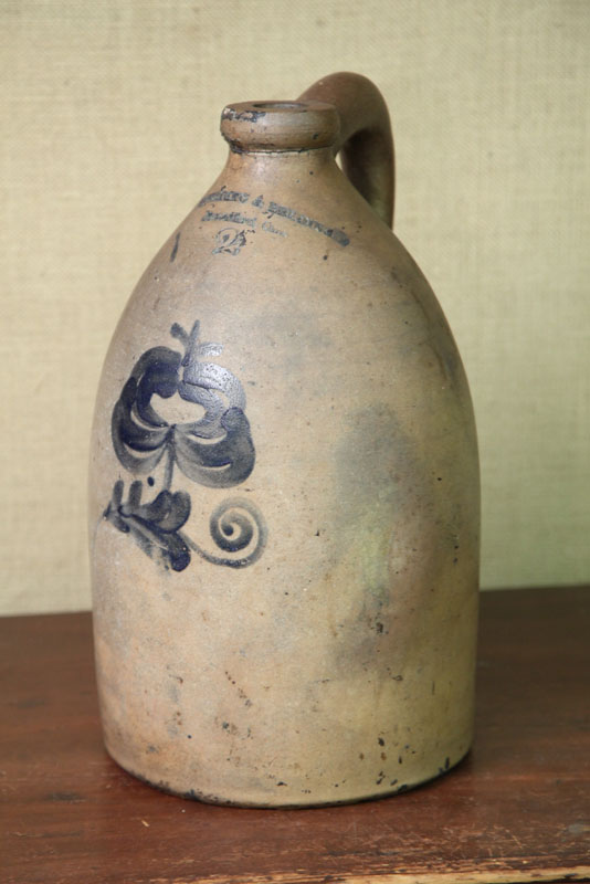 Appraisal: TWO GALLON STONEWARE JUG With cobalt floral decoration and impressed