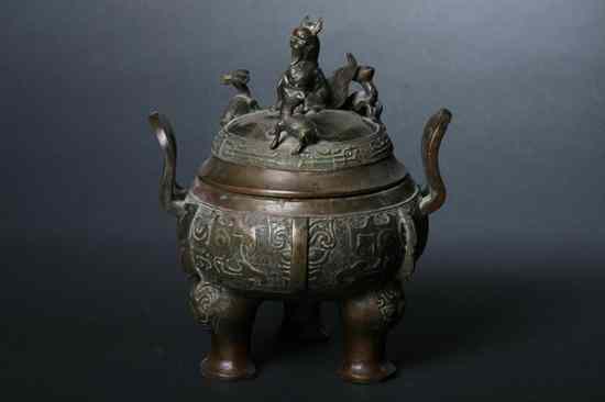 Appraisal: CHINESE ARCHAISTIC BRONZE CENSER Cast with two handles - in