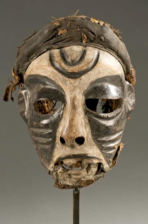 Appraisal: DRC grotesque face mask th cen A grostesque black and