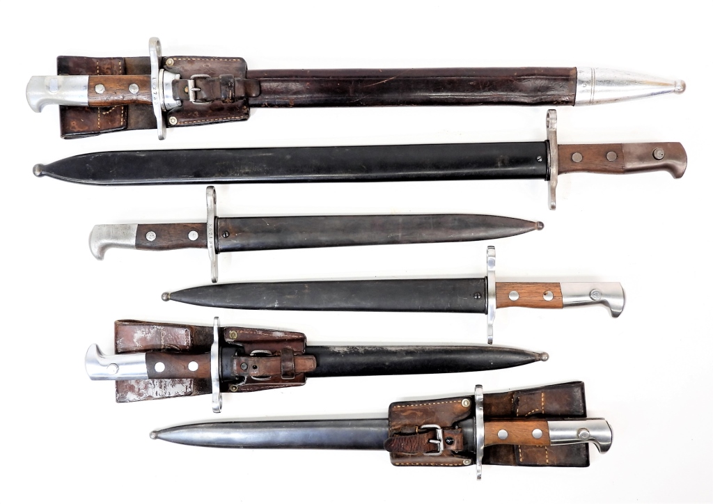 Appraisal: GROUP OF SWISS BAYONETS AND SCABBARDS Switzerland A Model sawback