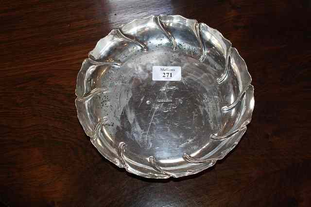 Appraisal: A LATE VICTORIAN SILVER STRAWBERRY DISH with wrythen shaped sides