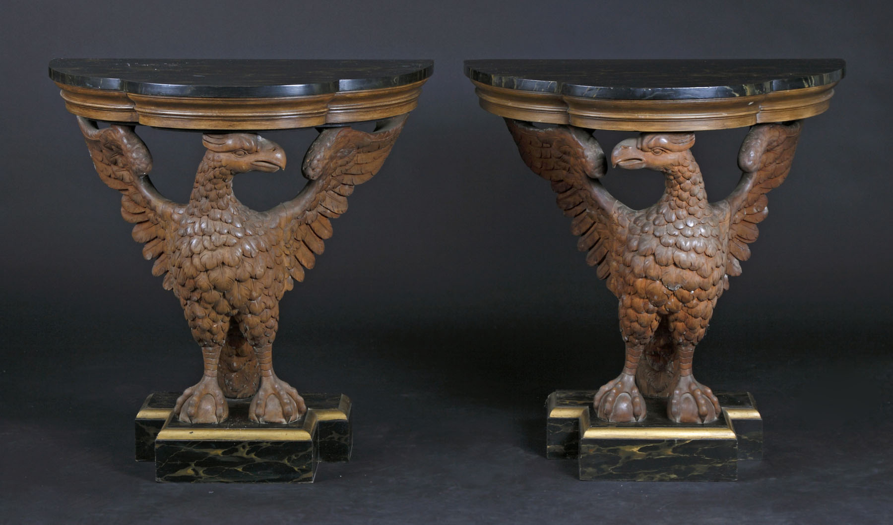 Appraisal: Pair of Carved Eagle Side Tables Faux Marble tops and