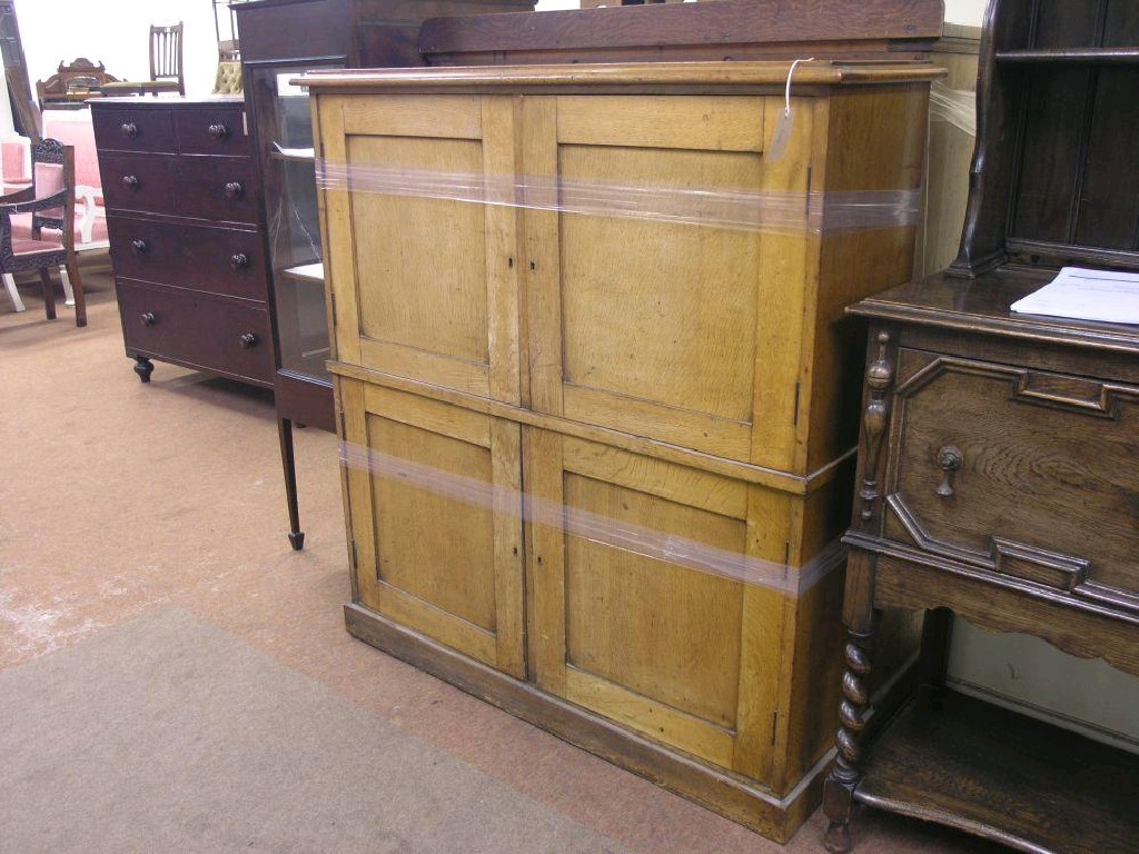 Appraisal: A late Victorian solid light oak office cupboard with two