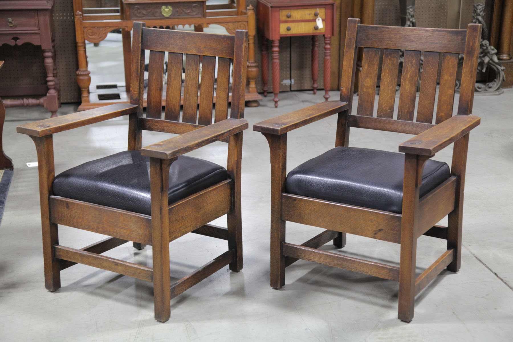 Appraisal: PAIR OF GUSTAV STICKLEY ARMCHAIRS New York early th century