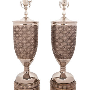 Appraisal: A Pair of Silvered Metal Mounted Pottery Vases Mounted as