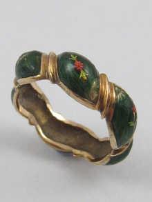 Appraisal: A yellow metal tests carat gold and green enamel ring