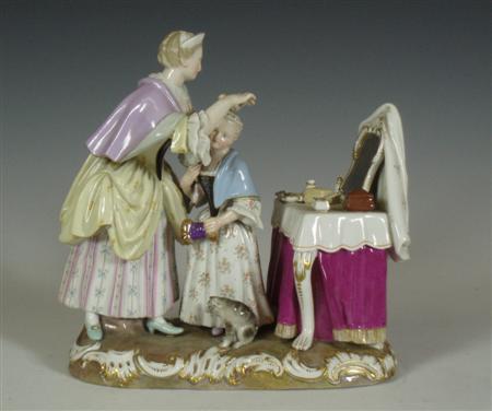 Appraisal: A th century Meissen figure group of a mother and