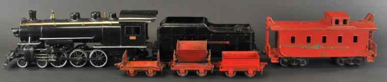 Appraisal: BUDDY 'L' LOCOMOTIVE TENDER CABOOSE Outdoor Railroad pieces includes Locomotive