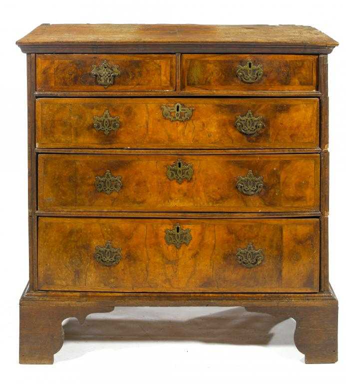 Appraisal: A GEORGE I WALNUT CHEST OF DRAWERS with quarter veneered