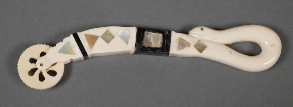 Appraisal: Antique s whale ivory pie crimper with mother-of-pearl inlay and