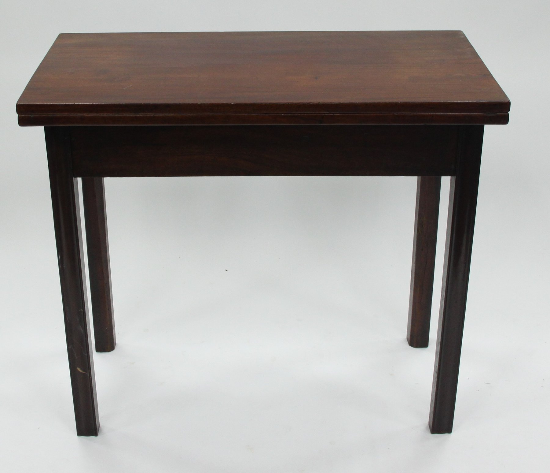 Appraisal: A George III mahogany tea table on square moulded legs