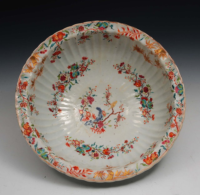 Appraisal: A Chinese porcelain reeded bowl th Centurydecorated in the famille