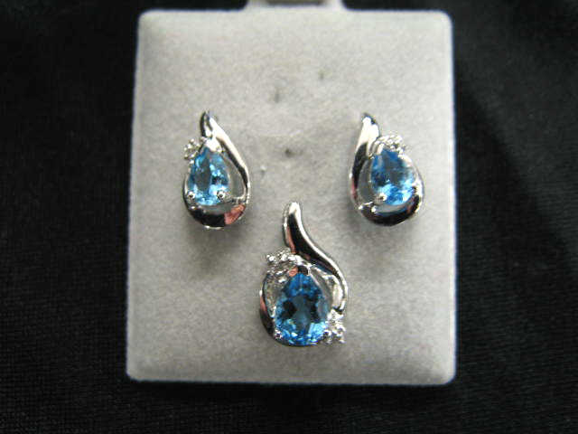 Appraisal: Blue Topaz Earrings Pendant pear shaped gems in k white