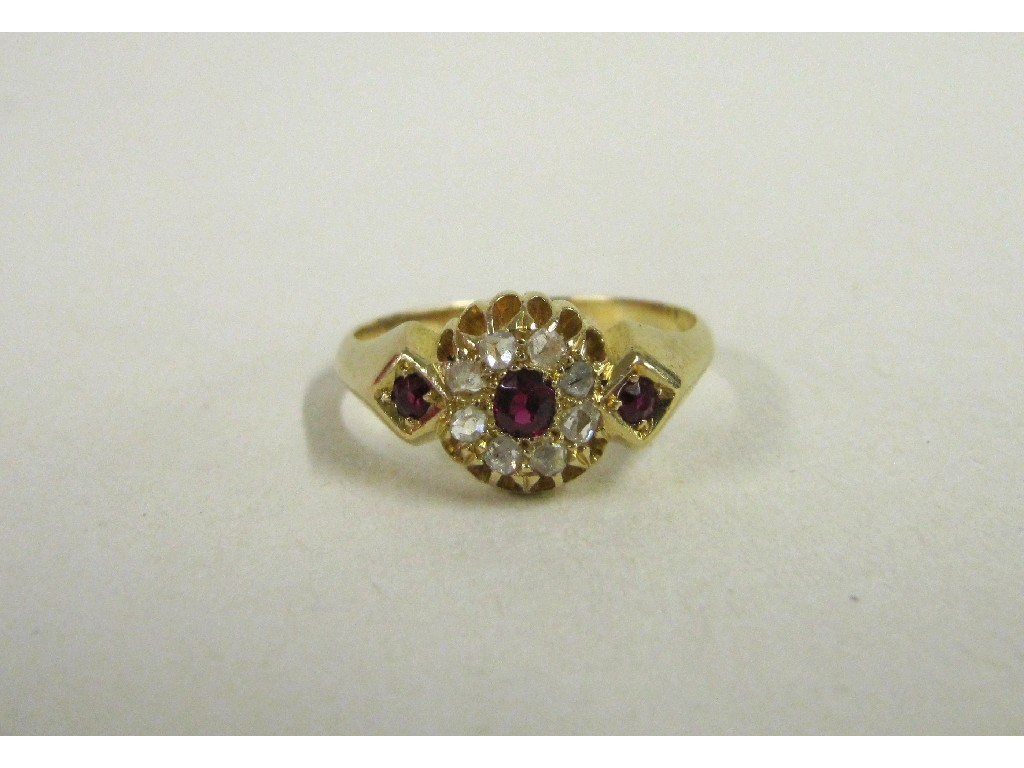 Appraisal: Eighteen carat gold ruby and diamond set dress ring hallmarked