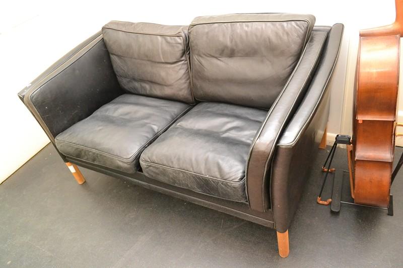 Appraisal: A DANISH BLACK LEATHER TWO SEAT SOFA A DANISH BLACK