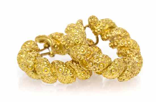 Appraisal: A Pair of Karat Yellow Gold Earclips in a textured