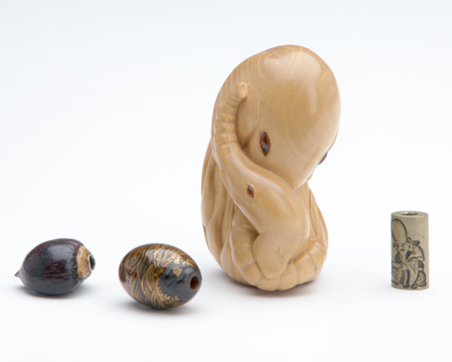 Appraisal: JAPANESE NETSUKE AND OJIME Unstained boxwood netsuke by Guy Shaw