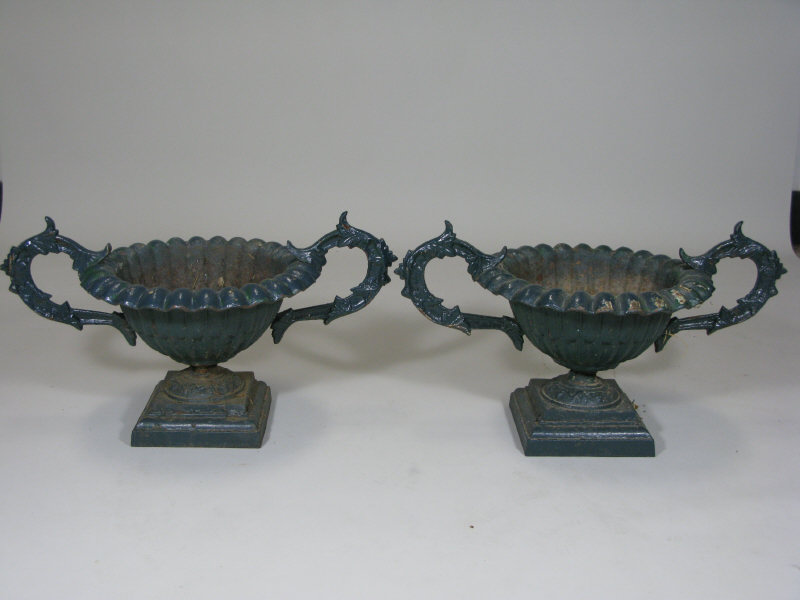 Appraisal: Pair of Victorian Cast Iron Garden Urns with high arched