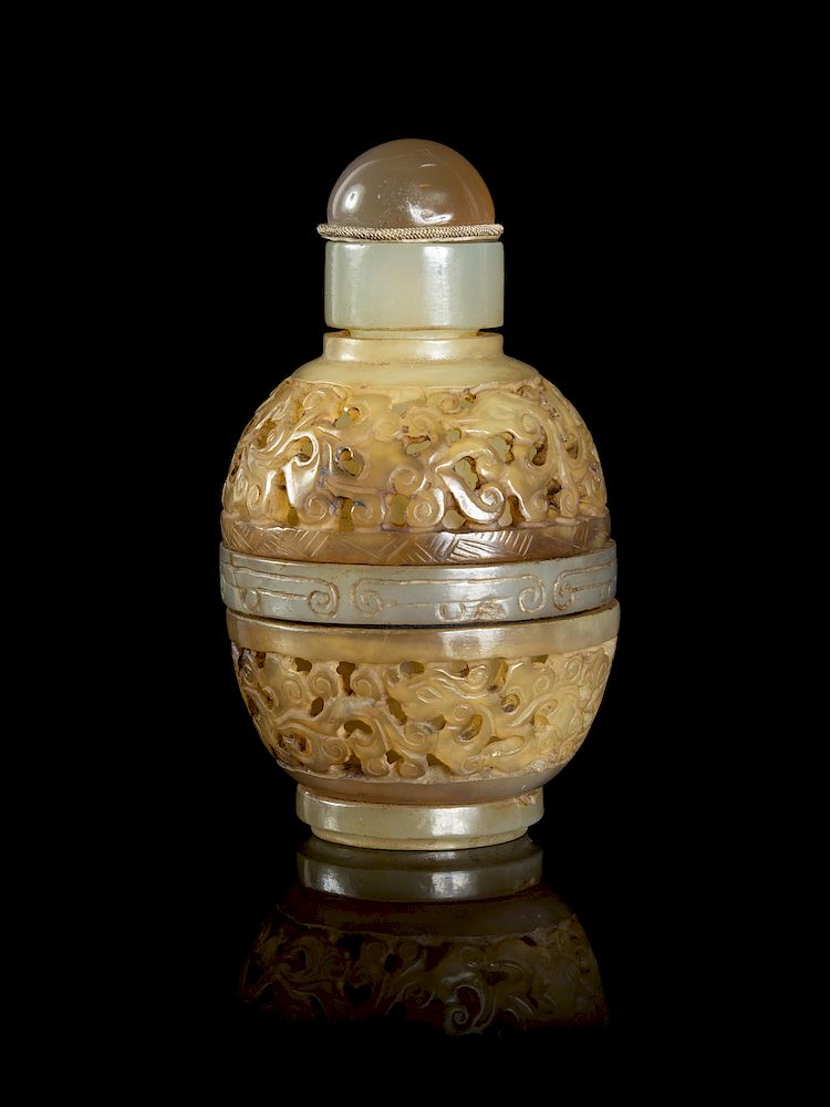 Appraisal: A Chinese Carved Celadon Jade Snuff Bottle Height in cm