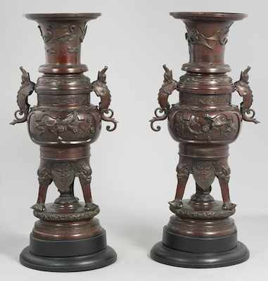 Appraisal: A Pair of Large Cast Metal Chinese Urns After the