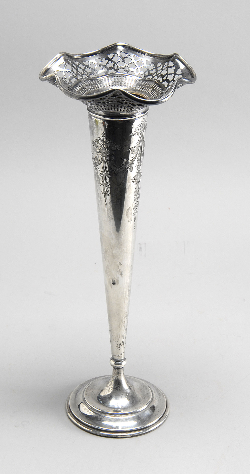 Appraisal: STERLING SILVER VASE in trumpet form with reticulated rim Height