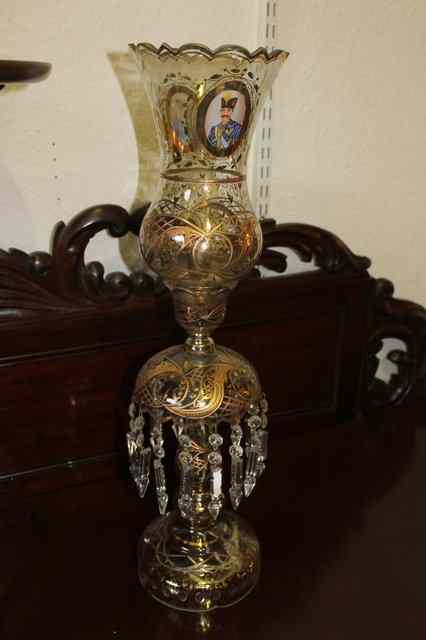 Appraisal: A CONTINENTAL GLASS LAMP with gilded decoration baluster drops and