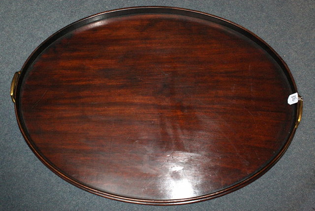 Appraisal: A TH CENTURY MAHOGANY OVAL TWO HANDLED TEA TRAY with