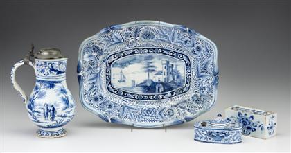 Appraisal: Group of blue and white DelftwareComprising a pear shaped tankard