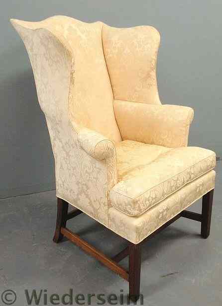 Appraisal: Chippendale mahogany wingchair with yellow Scalamandre upholstery h x w