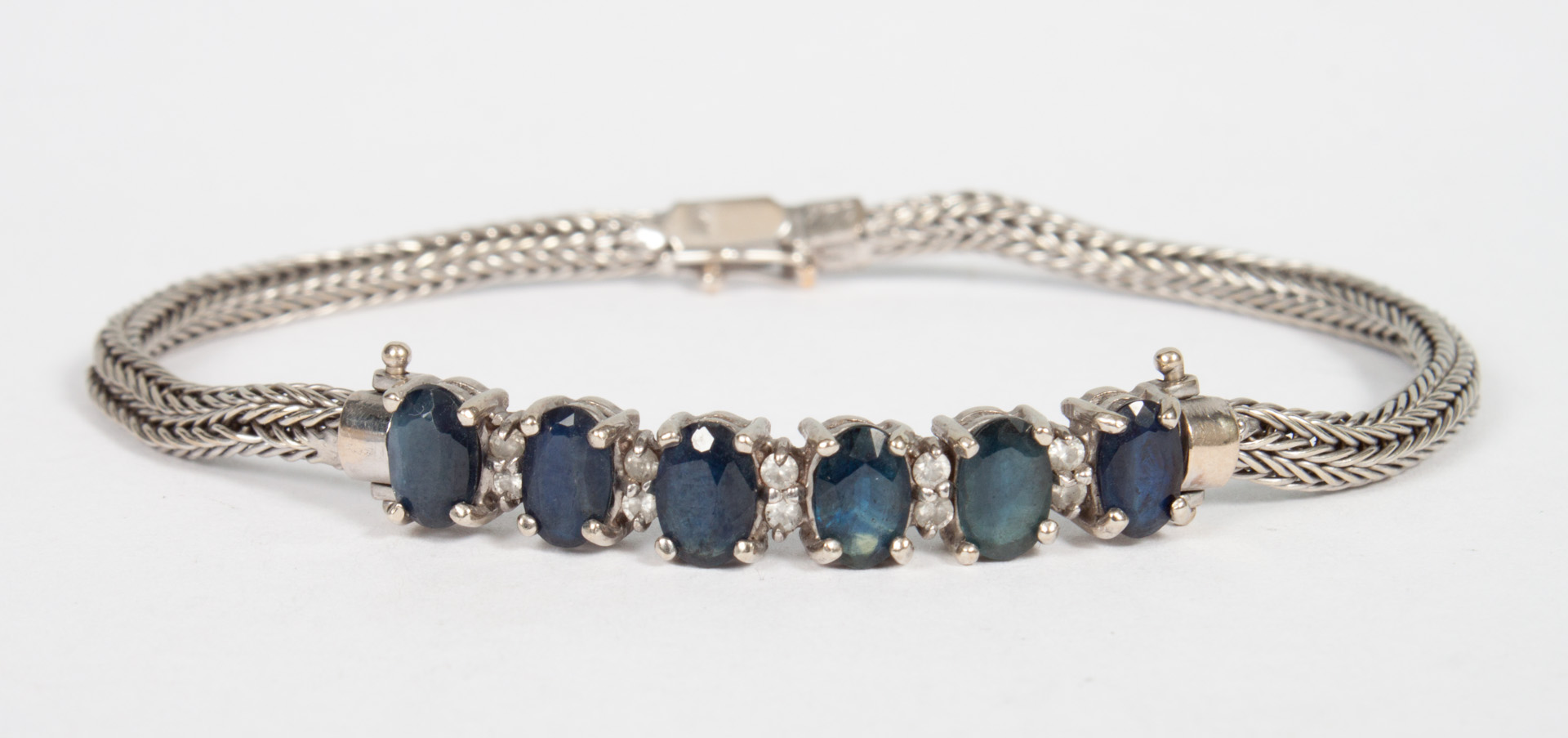 Appraisal: Lady's white gold sapphire bracelet with small white synthetic stones