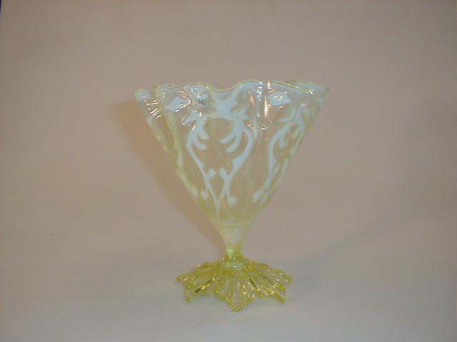 Appraisal: A fine Victorian lemon yellow vaseline glass flared fluted vase