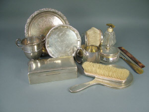 Appraisal: A matched eight piece silver-mounted dressing table set each with