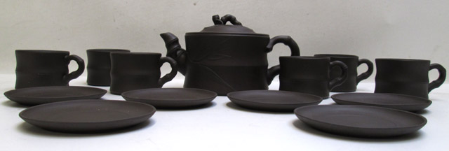 Appraisal: CHINESE REDWARE TEA SET consisting of tea pot six cups