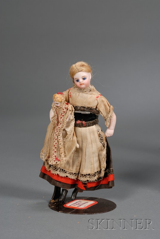 Appraisal: Bisque Swivel-Head Dollhouse Doll in Regional Dress with closed mouth