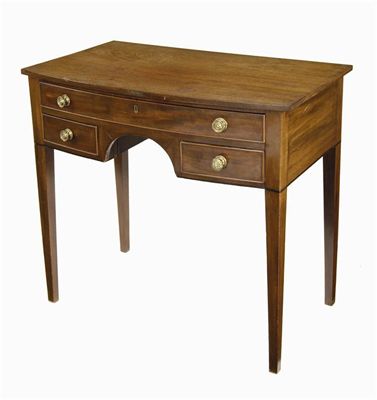 Appraisal: A late Regency mahogany bowfront dressing table with one long