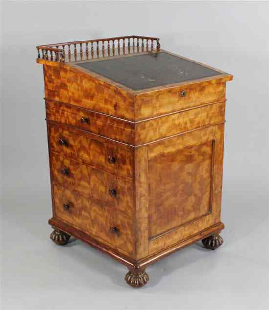 Appraisal: A William IV satinwood Davenport in the manner of Gillows