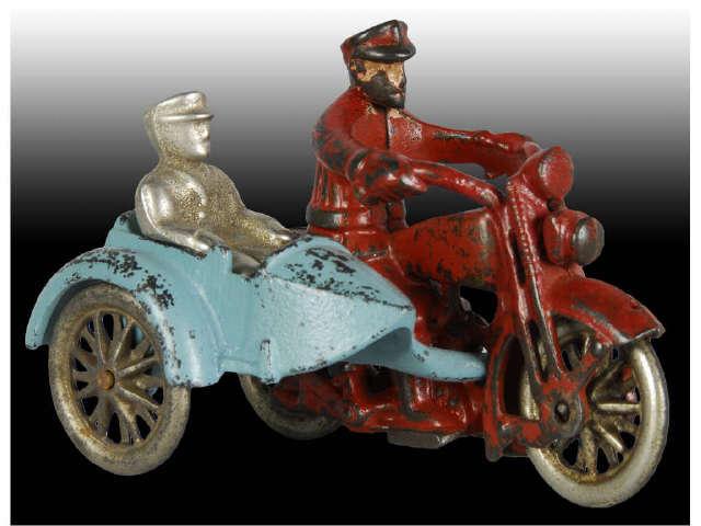 Appraisal: Cast Iron Harley Davidson Motorcycle Toy Description Red motorcycle with