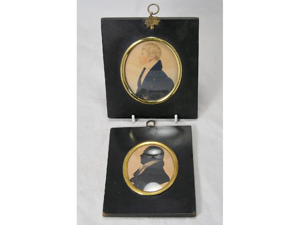 Appraisal: Two Regency profile portrait miniatures of gentlemen in ebonised frames