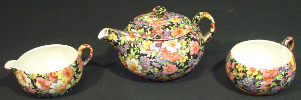 Appraisal: James Kent Floral Chintz bachelor's teapot cream jug and teacup