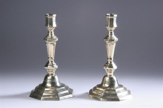 Appraisal: PAIR FRENCH BURNISHED BRASS CANDLESTICKS late th century Stepped octagonal